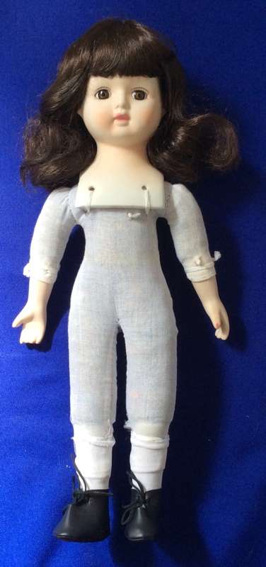 Vintage Porcelain Doll with Glasses