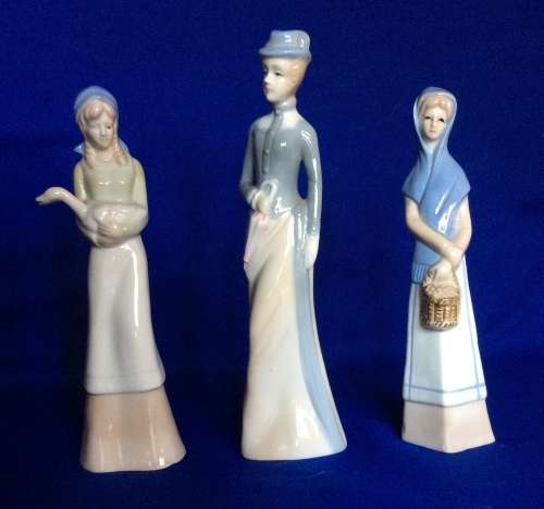 Set of Three Porcelain Figurines in Pastel Tones