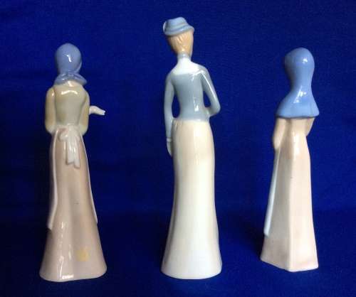 Set of Three Porcelain Figurines in Pastel Tones