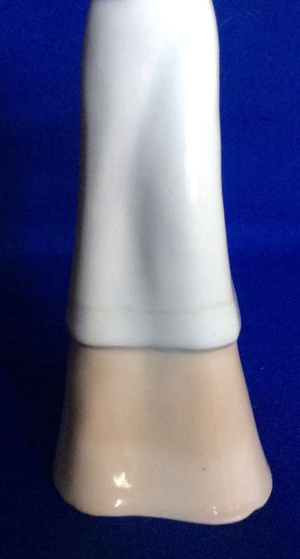 Set of Three Porcelain Figurines in Pastel Tones