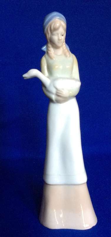 Set of Three Porcelain Figurines in Pastel Tones