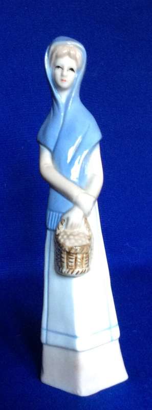 Set of Three Porcelain Figurines in Pastel Tones