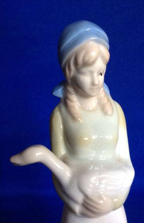 Set of Three Porcelain Figurines in Pastel Tones