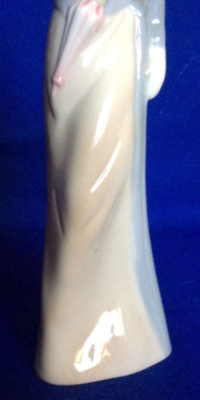 Set of Three Porcelain Figurines in Pastel Tones
