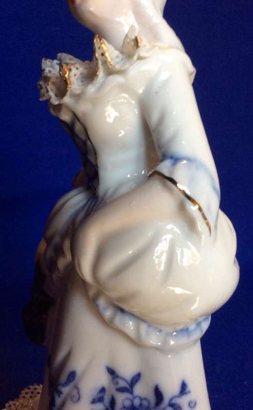 Matching Pair of Blue and White Porcelain Figurines