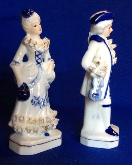 Matching Pair of Blue and White Porcelain Figurines