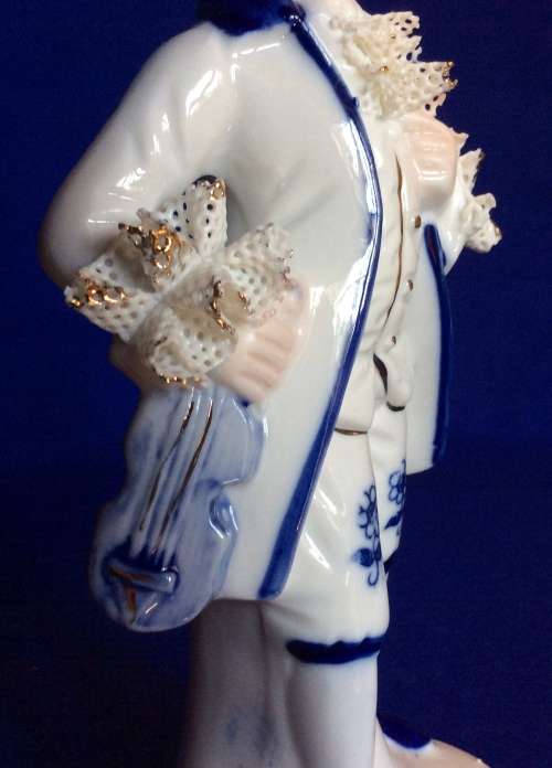Matching Pair of Blue and White Porcelain Figurines