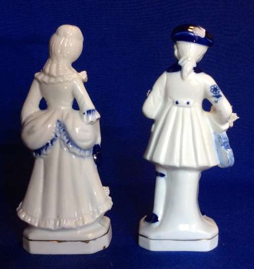 Matching Pair of Blue and White Porcelain Figurines