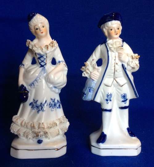 Matching Pair of Blue and White Porcelain Figurines
