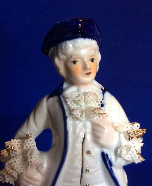 Matching Pair of Blue and White Porcelain Figurines