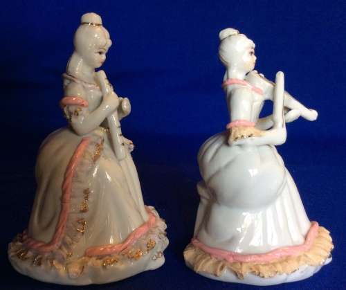 Matching Pair of Small Porcelain Musician figurines