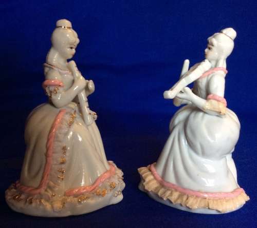 Matching Pair of Small Porcelain Musician figurines