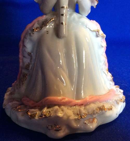 Matching Pair of Small Porcelain Musician figurines