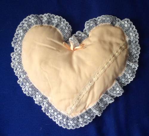 Sleeping Baby Porcelain Doll on Heart Shaped Pillow