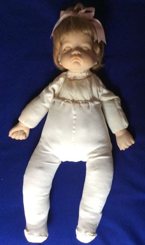 Sleeping Baby Porcelain Doll on Heart Shaped Pillow