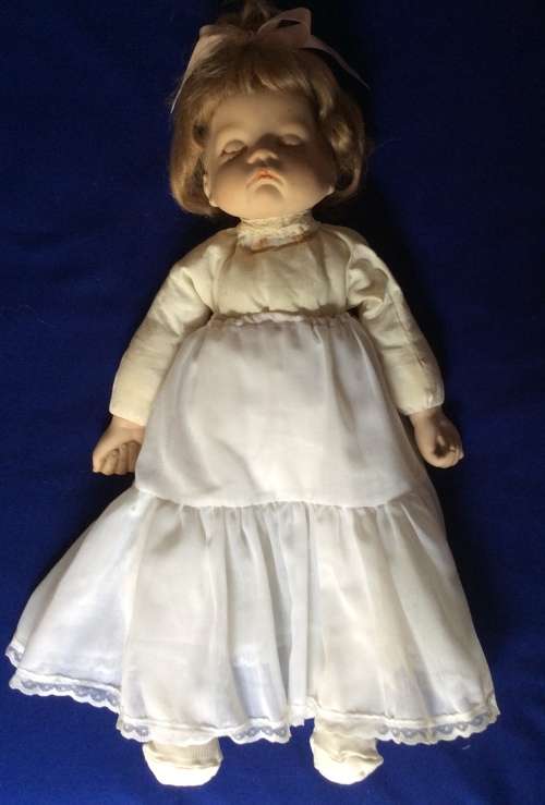 Sleeping Baby Porcelain Doll on Heart Shaped Pillow