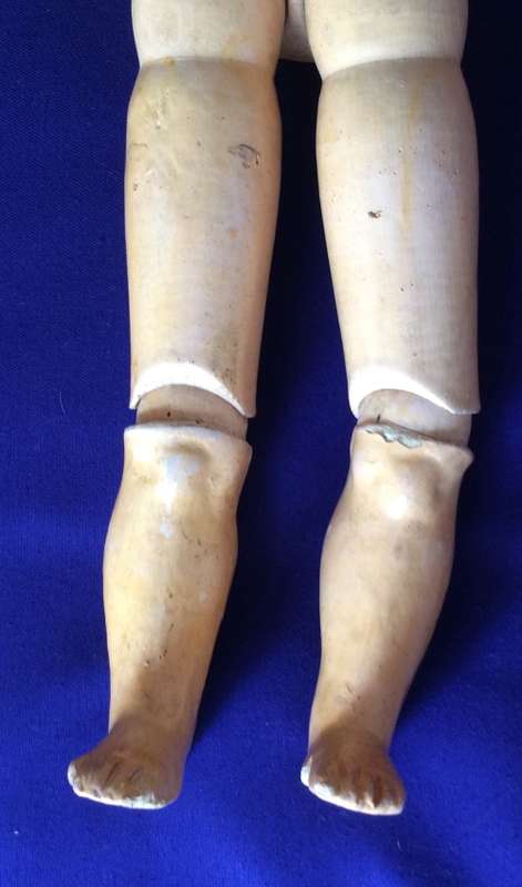 Antique Doll - Jointed Composition Body and Porcelain Head