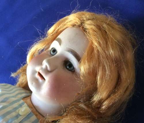 Antique Doll - Jointed Composition Body and Porcelain Head