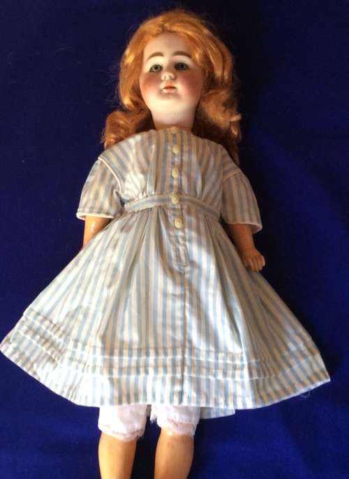 Antique Doll - Jointed Composition Body and Porcelain Head