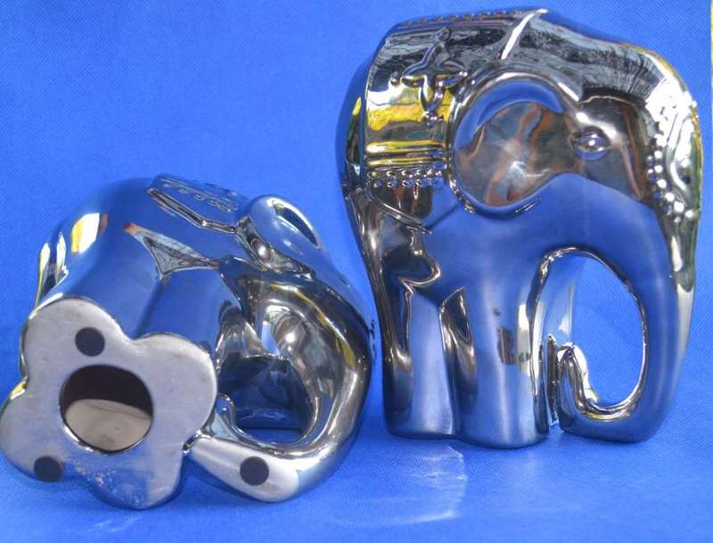 Pair of Silver Tone Ceramic Elephant Ornaments