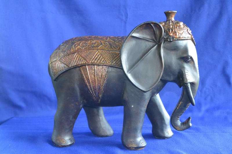 Large carved wooden Indian Elephant with Bronze Tone Cap and Coat