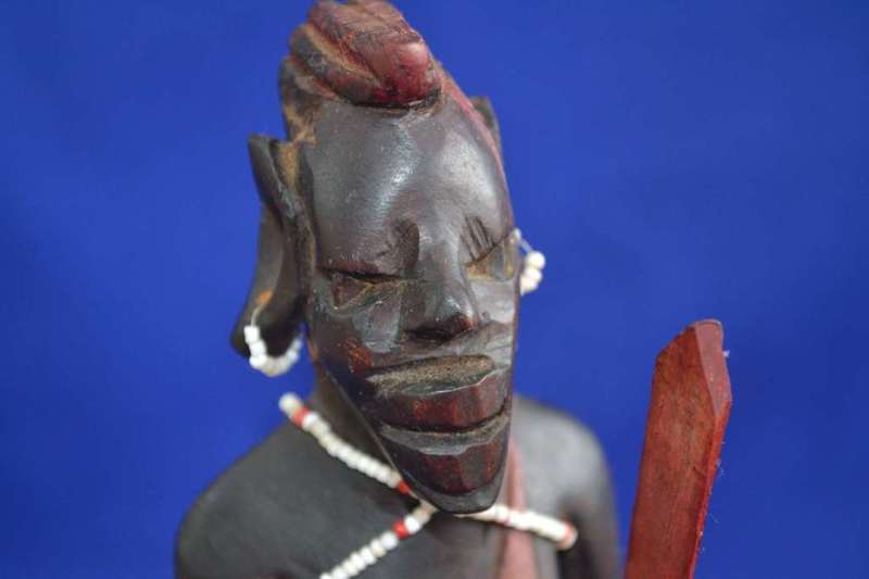 Traditional Masai Carved Wooden Figures and Miniature Hide Shield