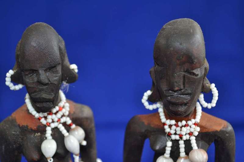 Traditional Masai Carved Wooden Figures and Miniature Hide Shield