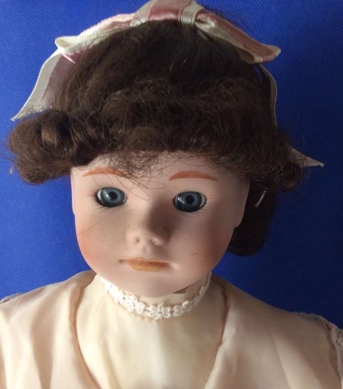 Vintage Porcelain Doll on Stand