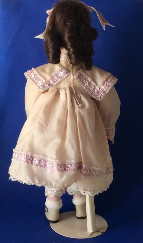 Vintage Porcelain Doll on Stand