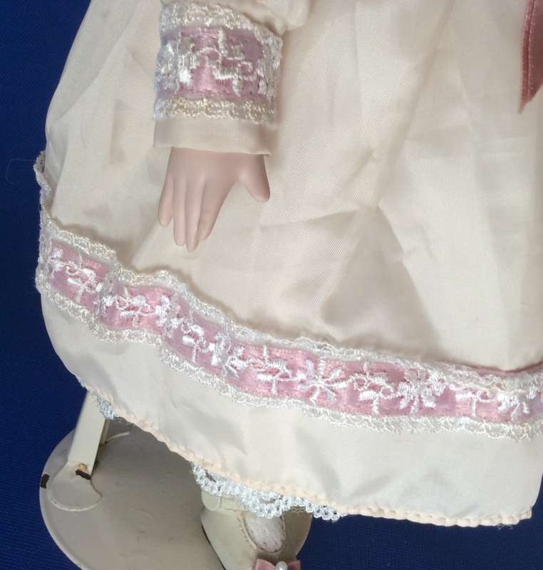 Vintage Porcelain Doll on Stand