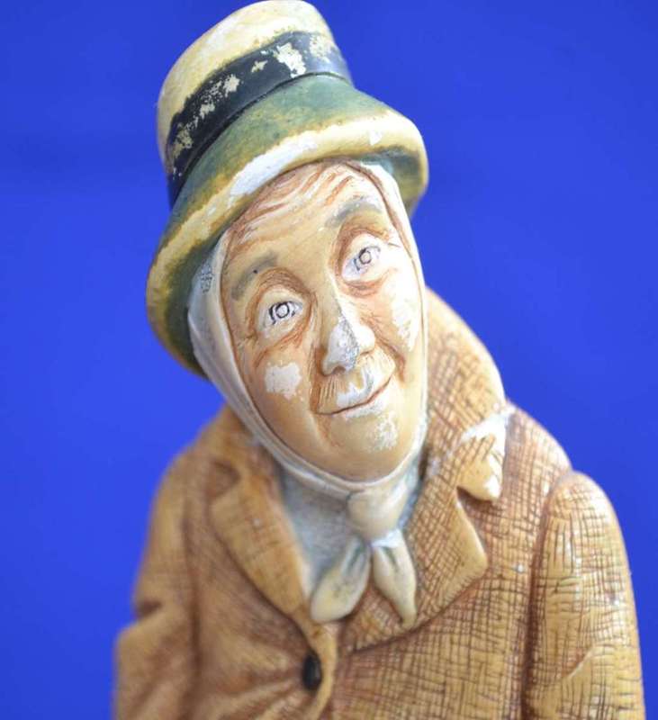 Naturecraft Hand Painted Chalkware / Stonewre Figures `News Vendor` and `Grand Finale`