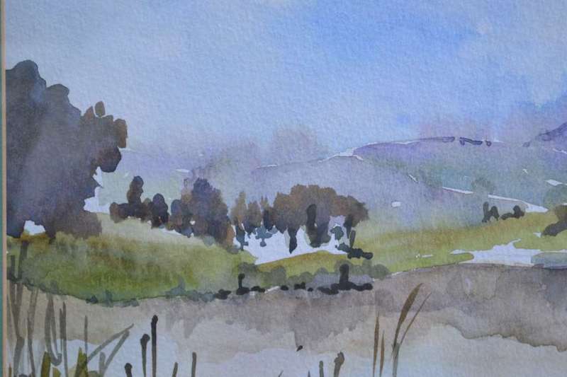 Watercolour Landscape framed behind Glass