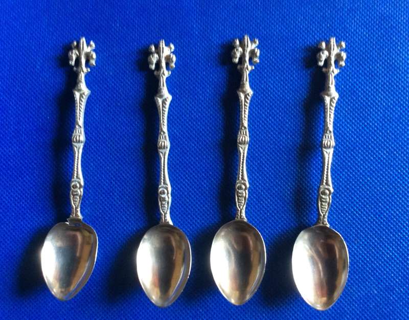 Vintage Ornate Handle spoons x 4