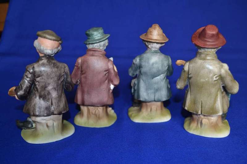 Set of Four Bisque Porcelain Figures