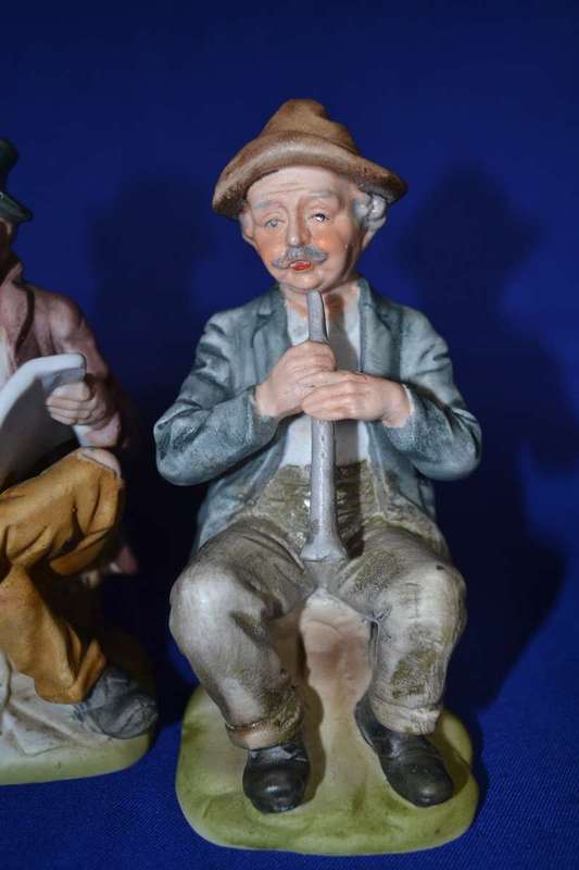 Set of Four Bisque Porcelain Figures