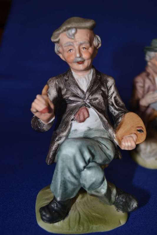 Set of Four Bisque Porcelain Figures