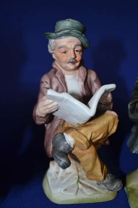 Set of Four Bisque Porcelain Figures