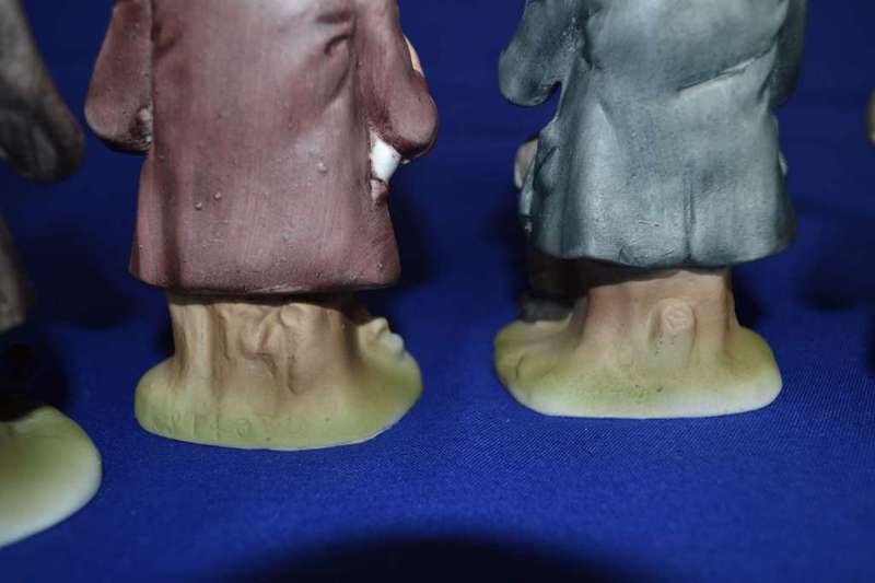 Set of Four Bisque Porcelain Figures