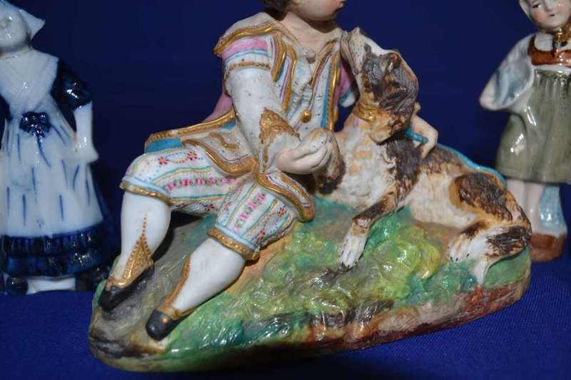 Boy with Dog Porcelain Group plus  Three Small Porcelain Figurines