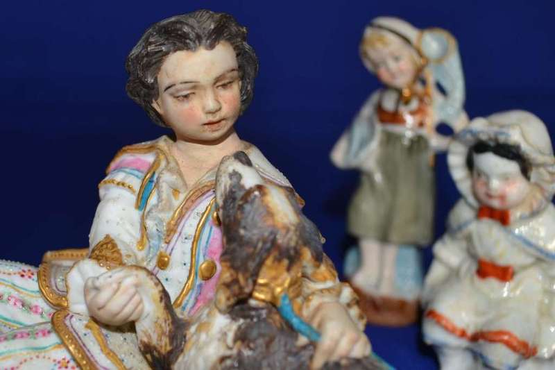 Boy with Dog Porcelain Group plus  Three Small Porcelain Figurines