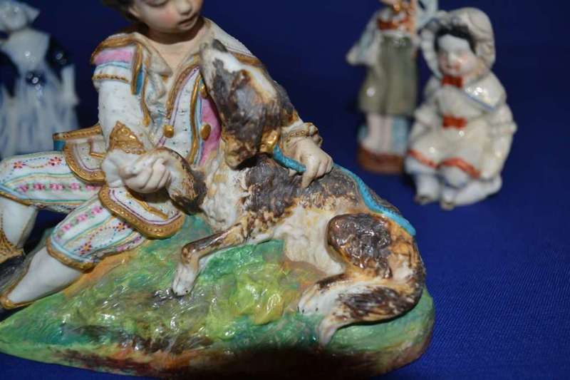 Boy with Dog Porcelain Group plus  Three Small Porcelain Figurines