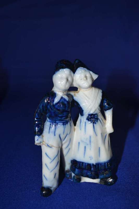 Boy with Dog Porcelain Group plus  Three Small Porcelain Figurines
