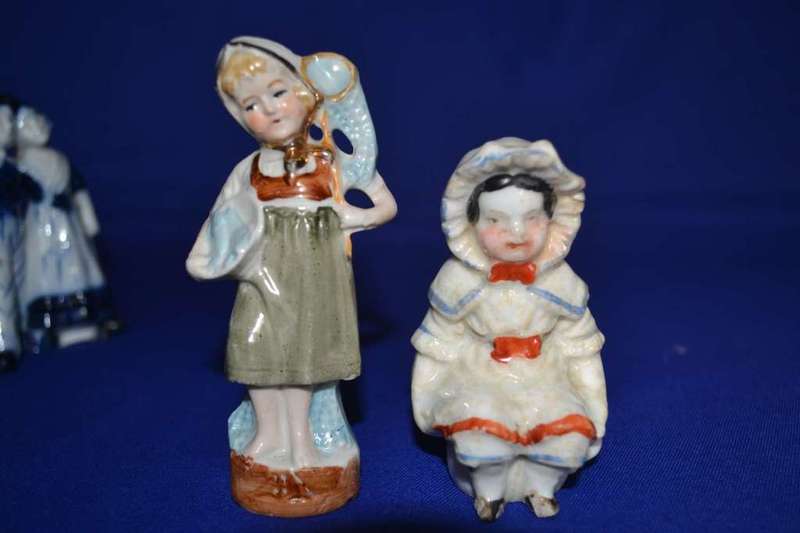 Boy with Dog Porcelain Group plus  Three Small Porcelain Figurines