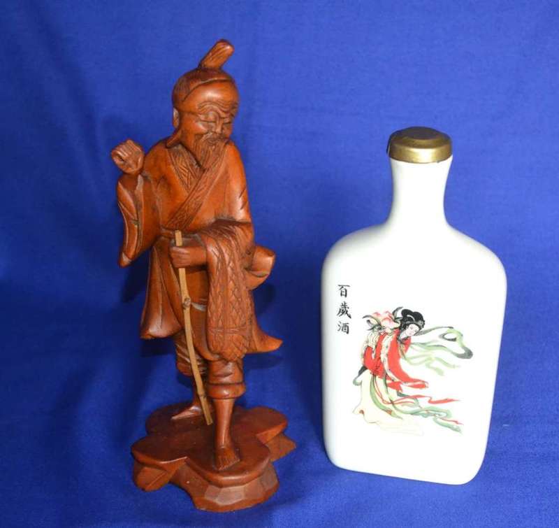 Carved Wooden Chinese Figure with Taiwan Tobacco & Wine Bottle