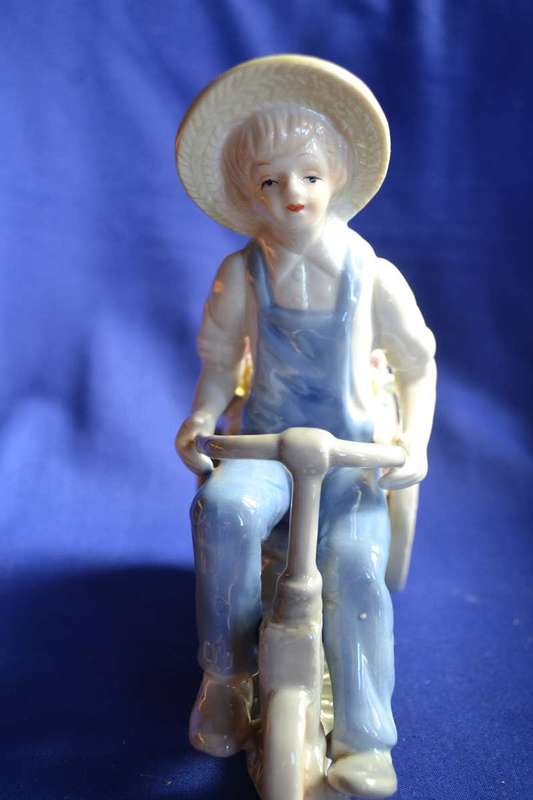 Porcelain Figures - Boy On Tricycle and Clown