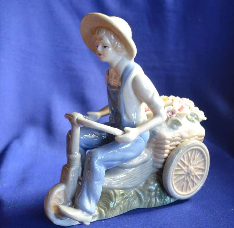 Porcelain Figures - Boy On Tricycle and Clown