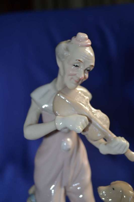Porcelain Figures - Boy On Tricycle and Clown
