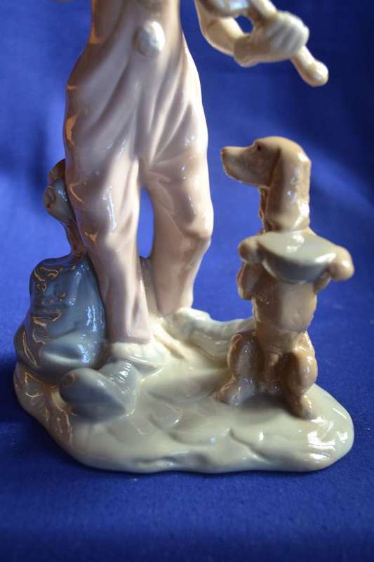 Porcelain Figures - Boy On Tricycle and Clown