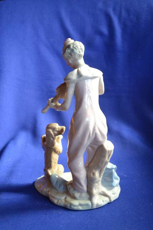 Porcelain Figures - Boy On Tricycle and Clown
