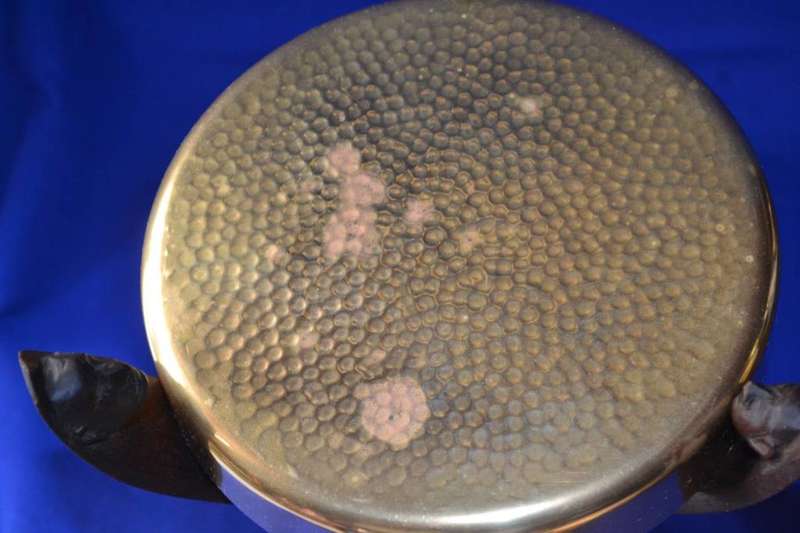 Small carved Tripod Table with Hammered Brass Top
